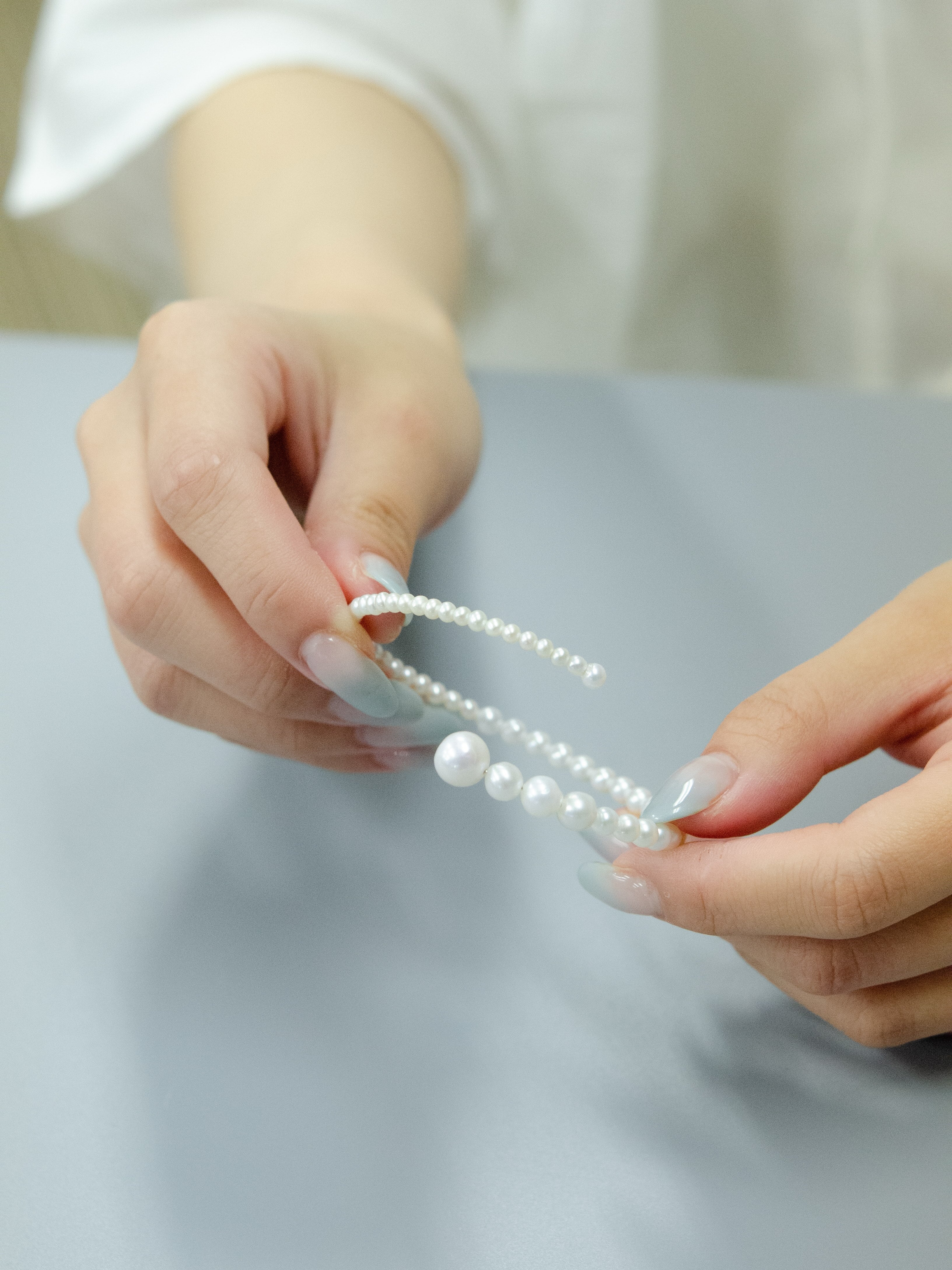 【気品を纏う純白】淡水パールのグラデーションブレスレット｜アレルギー対応