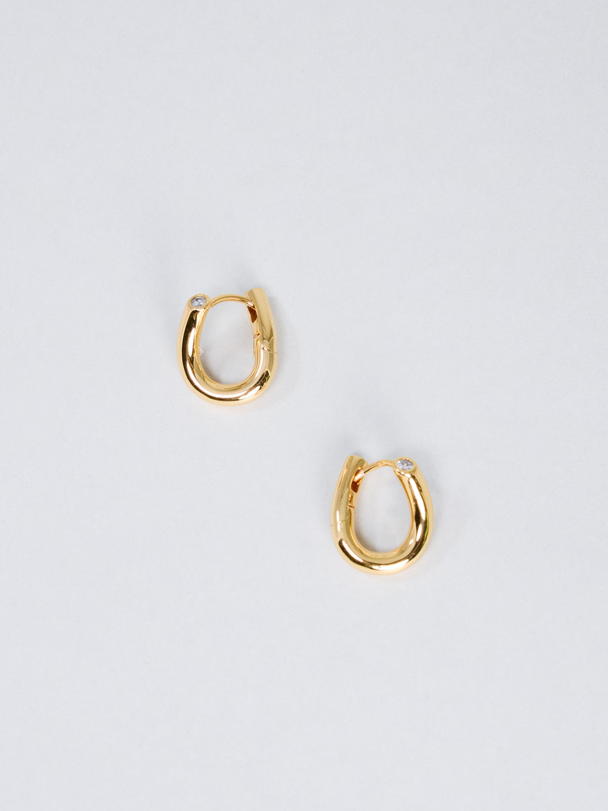 ツイスト フープピアス〈光の輪郭〉18Kゴールド／プラチナコーティング 立体ねじれ造形｜神戸アトリエ LUCINE