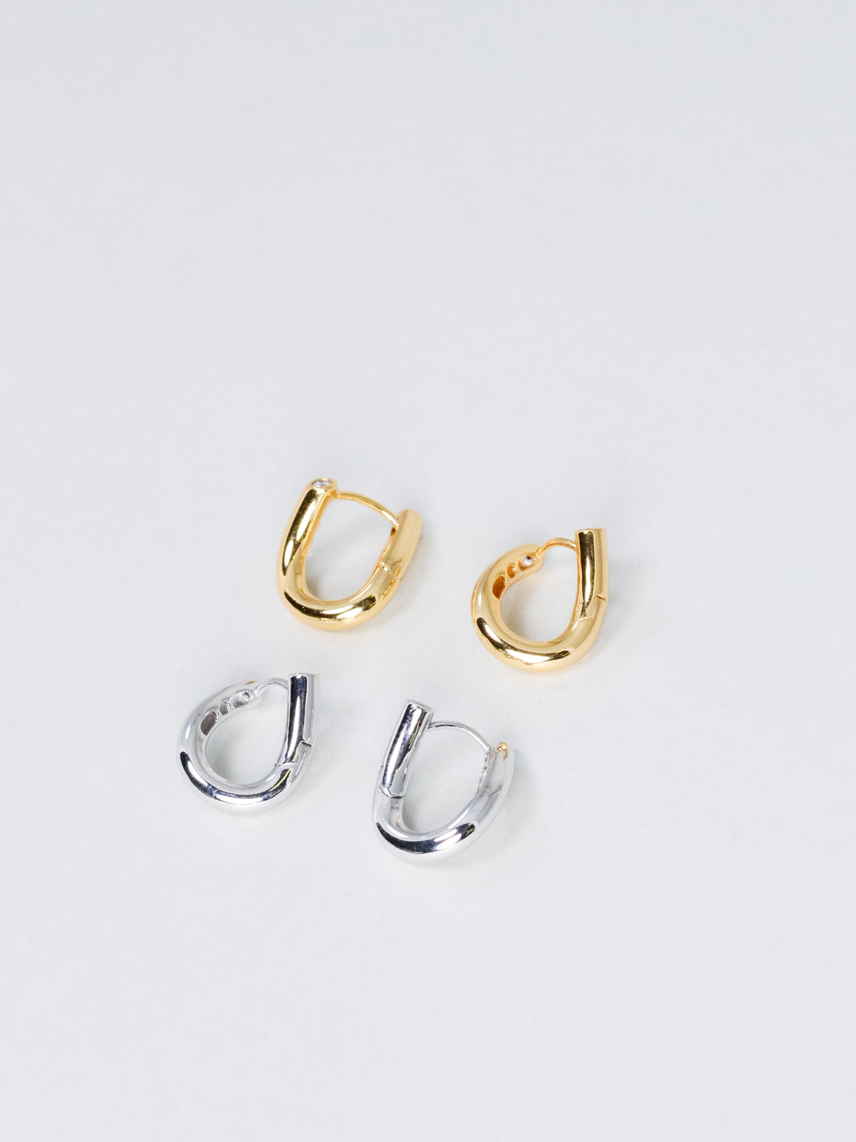 ツイスト フープピアス〈光の輪郭〉18Kゴールド／プラチナコーティング 立体ねじれ造形｜神戸アトリエ LUCINE