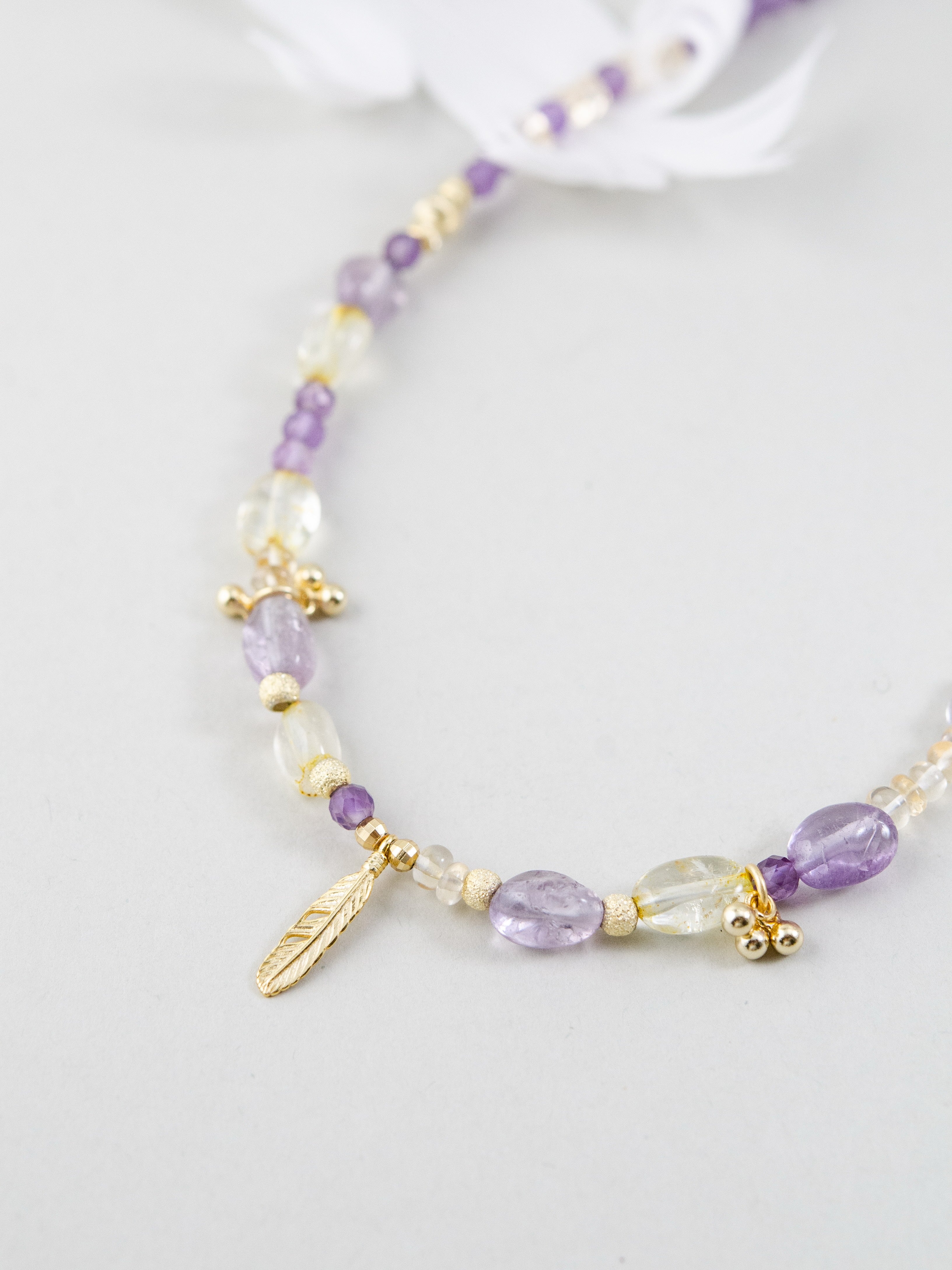 アメジストとシトリンのコンビネーション 菫色と蜂蜜色の天然石